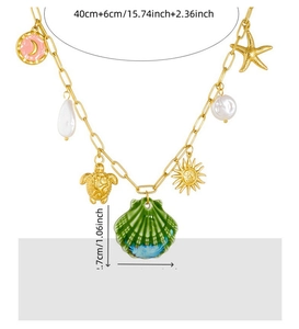 Detail of beach theme necklace with gold charms, gradient shell, and pearl pendants