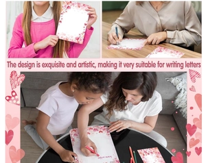 Detail of pink watercolor heart stationery set used for romantic wedding letters
