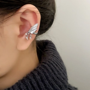 Elegant butterfly ear cuff with shimmering cubic zirconia and delicate tassel drop