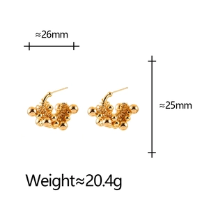 Detail view of 26mm gold-plated metal cluster earrings with spherical bead design