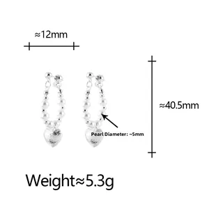 Detailed view of silver heart pearl earrings with precise size and weight dimensions