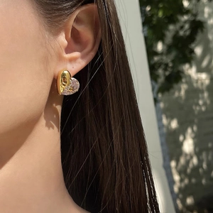 Elegant heart earrings featuring a mixed 18K gold polished and cubic zirconia stone design