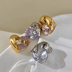 Elegant heart-shaped stud earrings with zircon stones in gold and silver finish