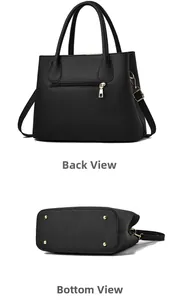 Detailed view of black litchi pattern leather handbag showing back zip pocket and bottom studs