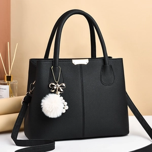 Classic black litchi pattern handbag for women with plush charm and gold hardware