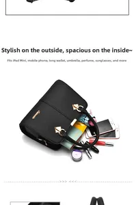 Detail view of black lychee leather handbag capacity with daily essentials and gold hardware