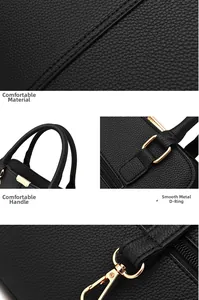 Detail of black lychee grain leather handbag featuring gold D-ring and metal hardware