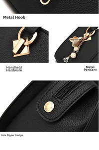 Detail of black pebbled leather handbag featuring gold hardware and floral pearl pendant