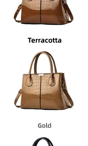 Detailed view of glossy crocodile-embossed leather handbags in tan and gold options