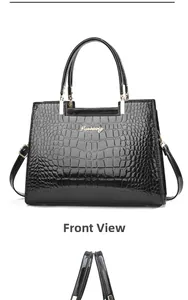 Front view of black crocodile pattern handbag with glossy finish and gold metal logo