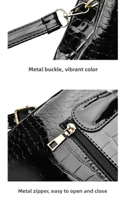 Detail of black faux crocodile texture with premium gold hardware and smooth zipper