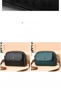 Detail of multi-layer cross-body mini bags in black and dark green litchi grain leather
