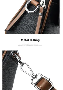 Close-up of silver D-ring and lobster clasp on black litchi pattern leather mini bag