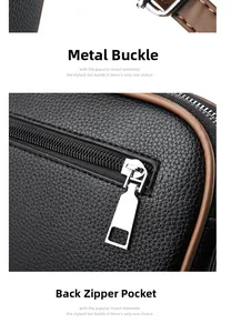 Detail of silver hardware buckle and back zipper pocket on black lychee leather bag