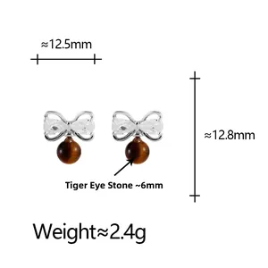 Detail showing dimensions of bow earrings with zircon and tiger's eye stone
