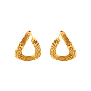 Textured gold teardrop hoop earrings with horizontal grooves in a minimalist metal design