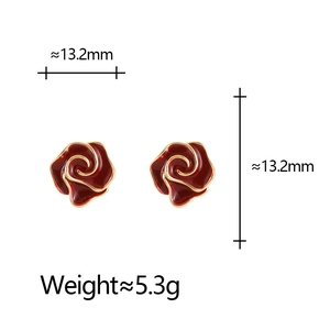 Detail view of red rose earrings with golden base showing 13.2mm size and 5.3g weight