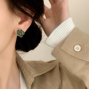 Retro green enamel rose earrings with silver trim for a vintage elegant look
