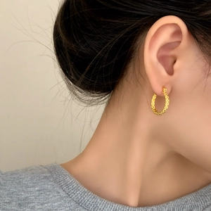 Minimalist geometric gold-plated hoop earrings with elegant twisted rope texture for women