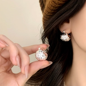 Chic silver hammered sphere drop earrings with textured finish for a vintage look