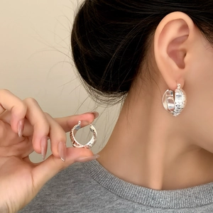 Silver striped double hoop earrings in a minimalist layered industrial design
