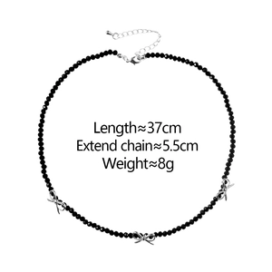 Detail view of black beaded choker necklace with silver bow charms showing length 37cm and 5.5cm