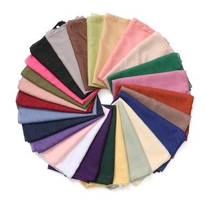 Glittering solid color silk chiffon shawls and headscarves in a wide range of vibrant shades