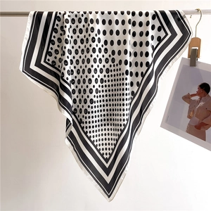 Elegant black and white satin floral scarf with geometric patterns and letter prints
