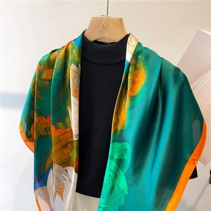 Elegant 90cm silk-like scarf with lotus print in emerald green and orange trim