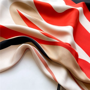 Elegant 90cm silk-feel square scarf with red and beige geometric pattern and twill texture