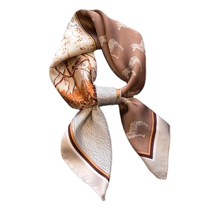 Elegant horse and zebra pattern silk scarf in brown and beige colors, tied knot style