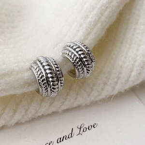 Elegant silver twisted rope hoop earrings with minimalist woven design for women