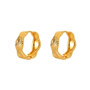 Golden chunky hoop earrings with wavy texture and beaded edge design on white background