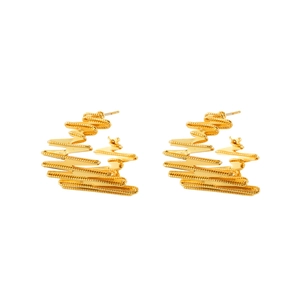 Modern irregular twisted gold hoop earrings with textured grainy finish for women