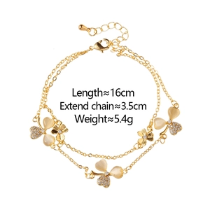 Gold double-layered bracelet with clover charms, micro-inlaid zircon and opal stones