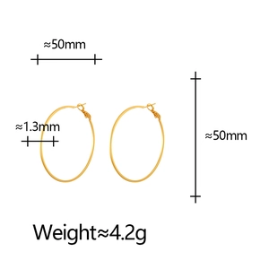 Detailed view of 50mm gold hoop earrings showing specific thickness and weight specs