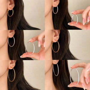 Minimalist gold and silver large hoop earrings in various sizes for daily fashion