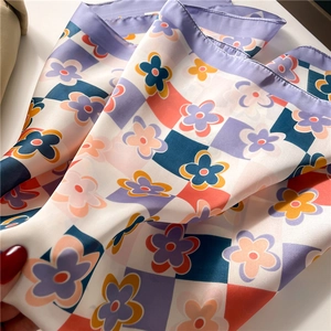 Checkerboard flower satin square scarf with pastel floral pattern and purple border