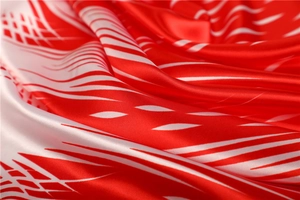 Detail showing the red satin scarf texture with white geometric lines and silky luster