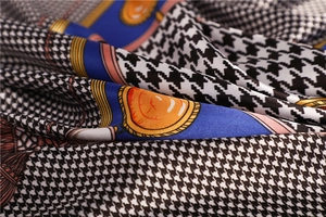 Macro shot of silk houndstooth scarf showing texture, elegant patterns and drape