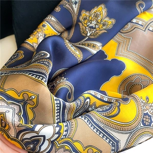 Elegant 90cm paisley floral print silk scarf with luxury glossy texture and navy yellow tones