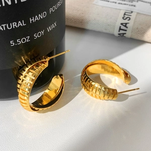 Elegant gold-plated striped C-shaped stud earrings with polished textured finish