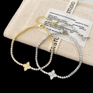 Luxuriöse Gold- und Silber-Glücksklee-Armbänder mit fein gefassten Zirkonia-Steinen