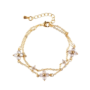Minimalist double-layer gold chain bracelet with zircon four-leaf flower and drop pendant