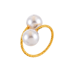 Close-up of gold plated ring featuring two white pearls on a textured twisted band