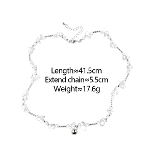 Detail of transparent glass bead necklace with silver ball pendant and size labels