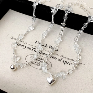 Elegant beaded choker with transparent quartz stone chips and heart pendant charm