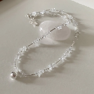 Minimalist clear glass bead necklace with silver ball pendant and dainty chain