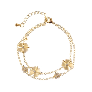 Bracciale a doppio strato in oro con quadrifogli in occhio di gatto e cristalli