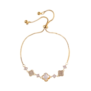 Adjustable gold clover bracelet with mother of pearl and shimmering pavé zircons